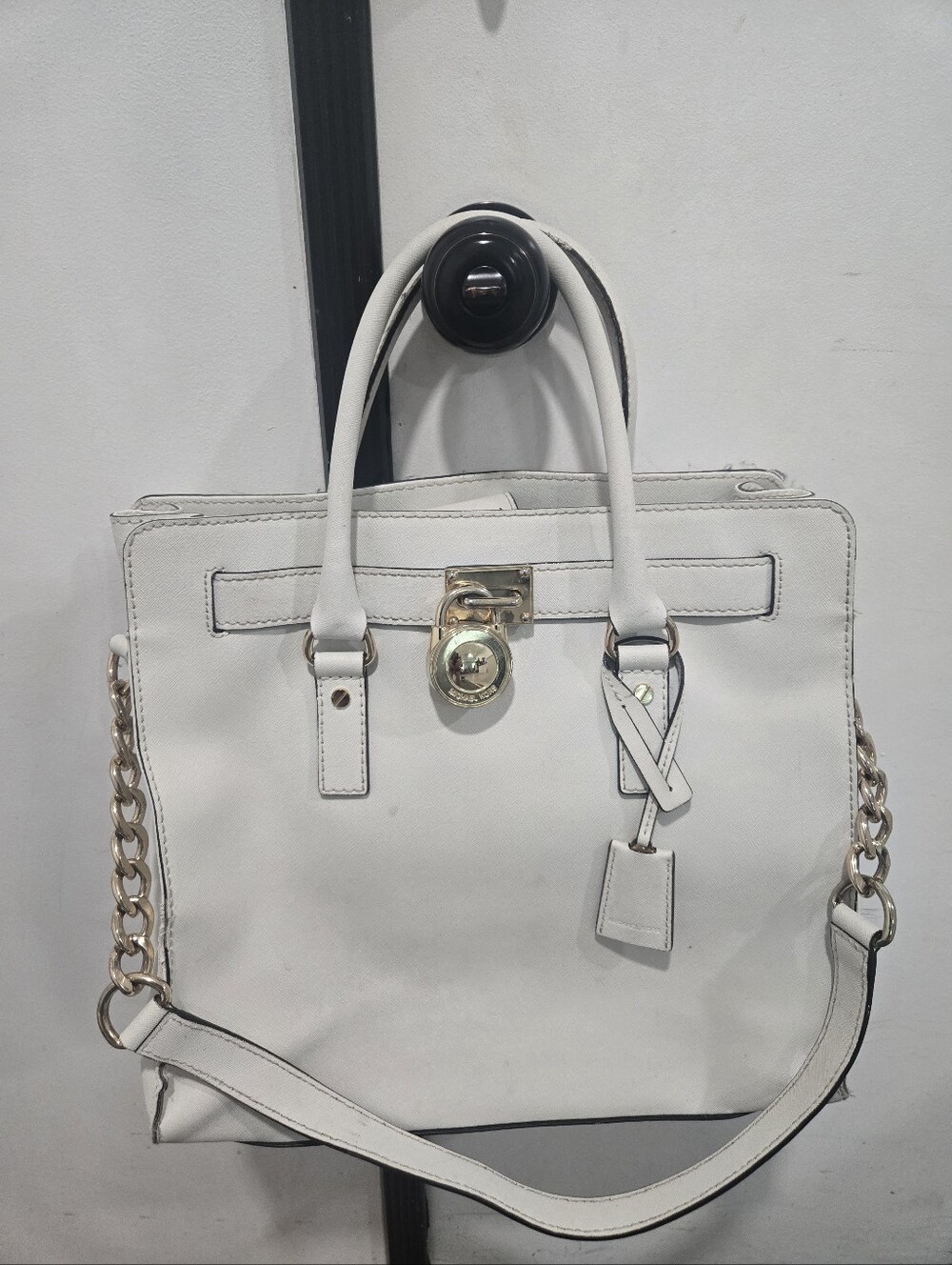 This is a white Saffiano leather Michael Kors Hamilton tote bag